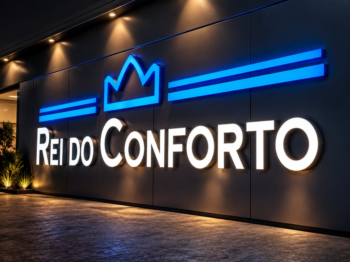 Fachada Rei do Conforto em ACM com letras iluminadas e detalhes em LED azul